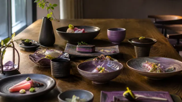 Seasonal omakase courses arranged on a wooden counter